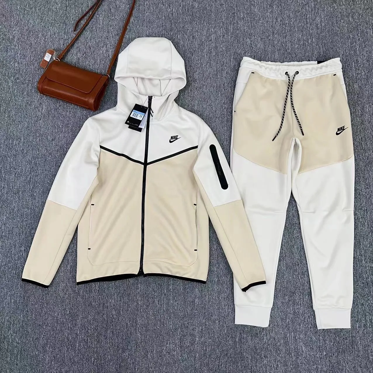 Swoosh tech track suit